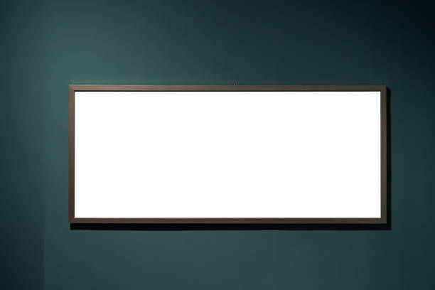 istock Wooden Picture Frame Isolated on Dark Green Background 1304522638
