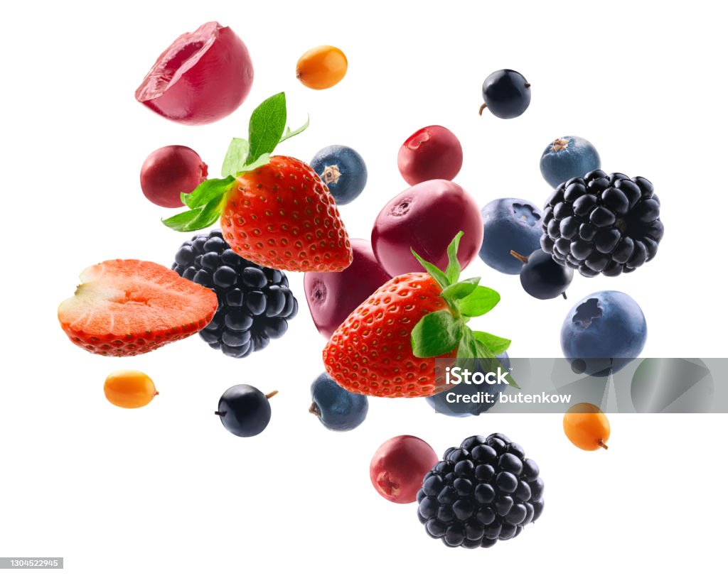 Many different berries in the form of a frame on a white background Many different berries in the form of a frame on a white background. Fruit Stock Photo