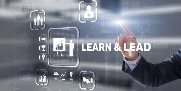 istock Learn and Lead. Businessman presses hand on the virtual screen inscription 1304526082