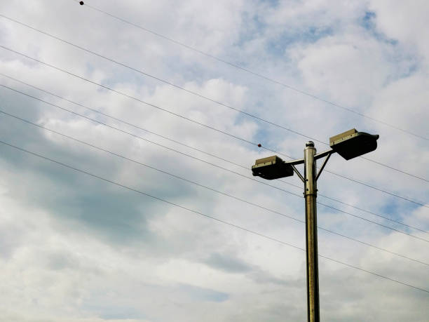 istock Headlights and cloudy skies 1304528273