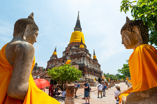 Ayutthaya, Thailand - May 18, 2019: Wat Yai Chaimongkon, the ancient Buddhist temple including ancient pagoda and Buddha statues where is the famous tourism travel destination in Ayutthaya, Thailand