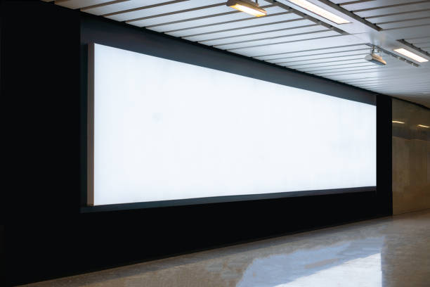 istock Blank billboard mock up signboard frame advertising located in subway underground hall, blurred background layout insert text for customer 1304529799