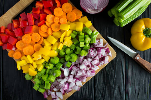 istock Chopped fresh vegetables  on the cutting board 1304530881