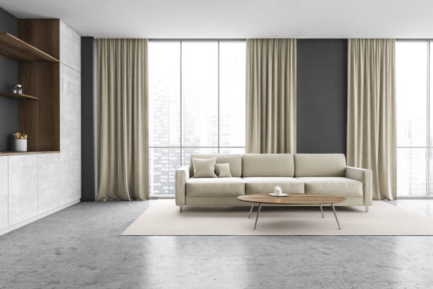 istock Wooden and grey kitchen set with sofa near window with curtains 1304532106