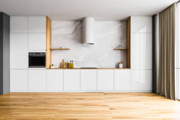 istock Wooden and white kitchen set near window with curtains 1304533192