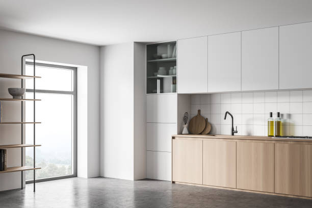 istock White and wooden kitchen corner with cupboards 1304533239