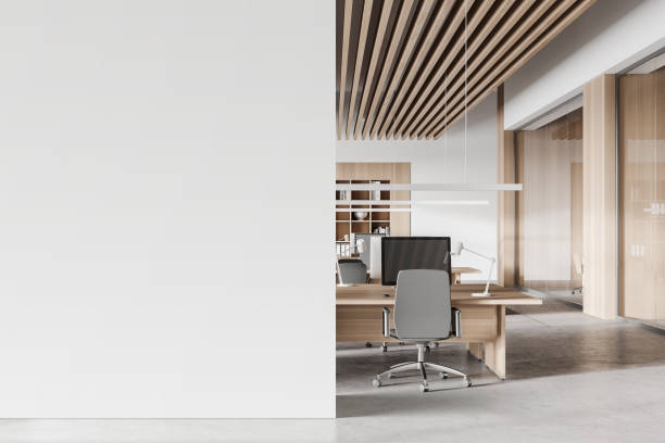 istock White and wooden open space office interior with mock up wall 1304533293