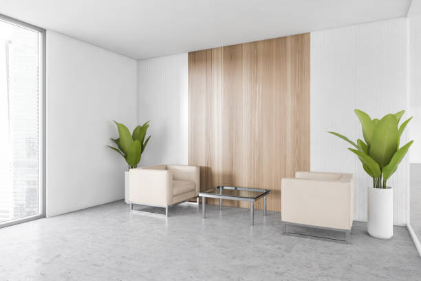istock Office waiting room with two armchairs and window with plants 1304534266