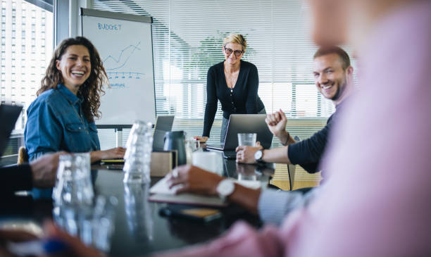 istock Business team smiling during a meeting 1304537447