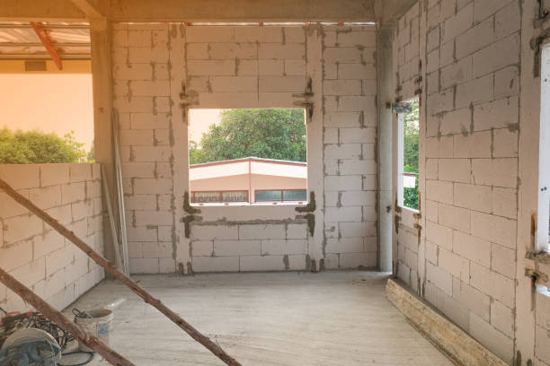 istock New house big window structure use light weight cement brick and white lintel plaster to joint for reinforce in site. 1304539781