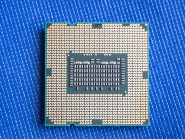 istock Bottom side of an modern CPU, showing its pins 1304539845