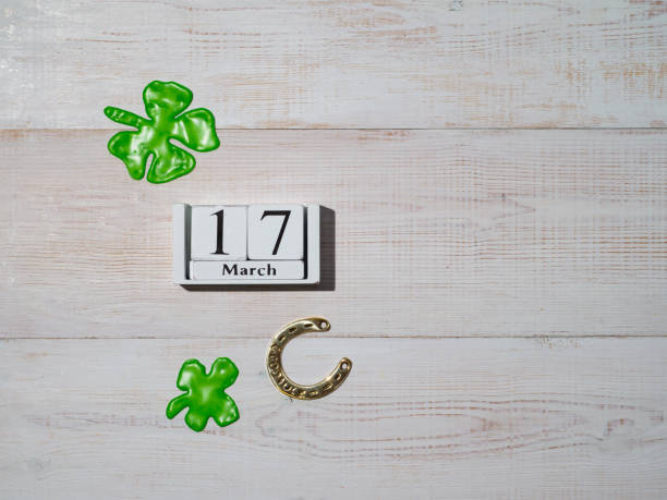 Saint Patricks day decoration on wooden background. Copy space for text and top view.