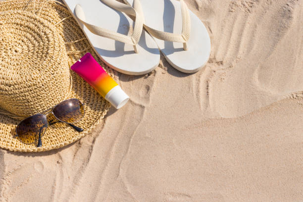istock Sunglasses and sunscreen lotion 1304542454