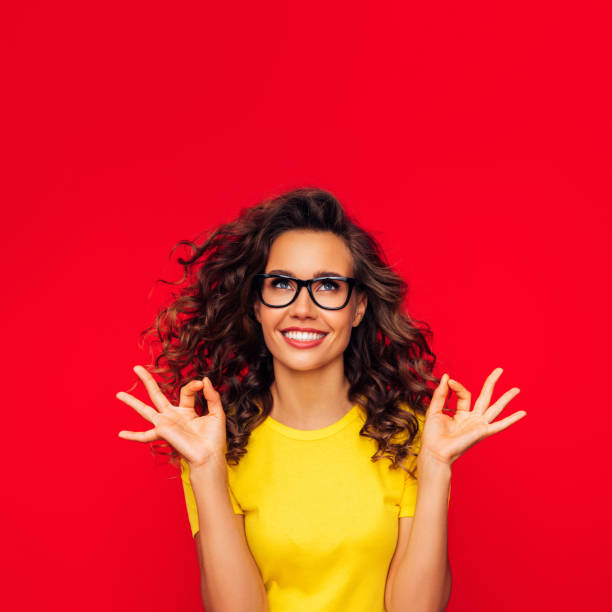 istock Attractive smiling young woman 1304543600