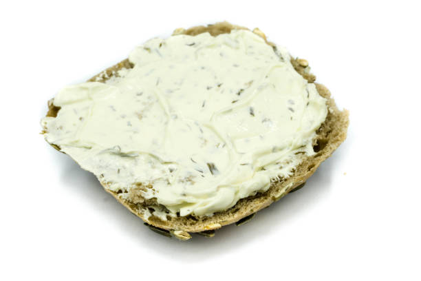 istock Bun with cream cheese isolated on white background 1304551915