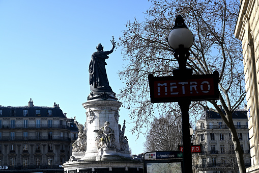 Paris, France - February 25, 2021: The monument in the middle of the large square symbolizes the victory of the Republic in France. The statue is dated 1833