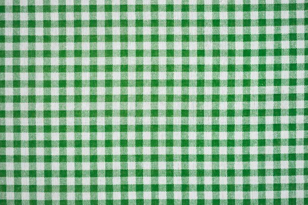Happy St. Patrick's day. Gingham pattern in green and white, closed up texture of green and white for background. Picnic table cloth. stock photo