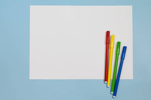 istock Copyspace blank of white paper covered with multiple colorful felt pen markers 1304557583