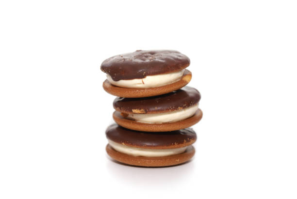 istock Chocolate cookies isolated on white 1304558258