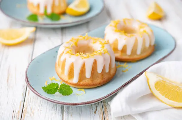 Photo of Mini lemon bundt cakes topped with lemon glaze