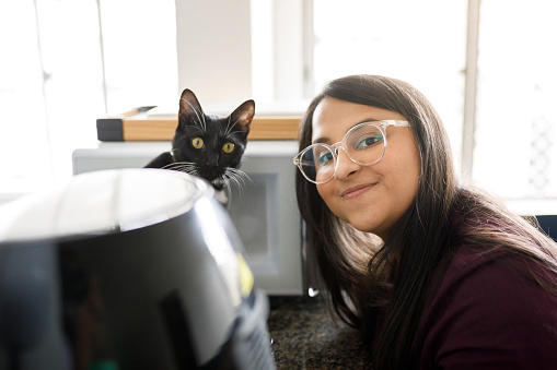 Portraits of women and pets