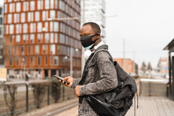 istock Wearing double face masks in the city 1304564068