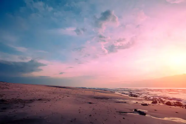 Photo of Seascape in the evening. Sunset over the beach. Nature landscape