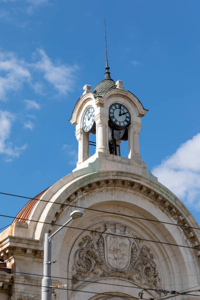 Sofia, Bulgaria - February 28, 2021: Clock Tower of the Halls. Covered market in the center of Sofia, the capital of Bulgaria, located on Maria Luiz Boulevard. It was opened in 1911
