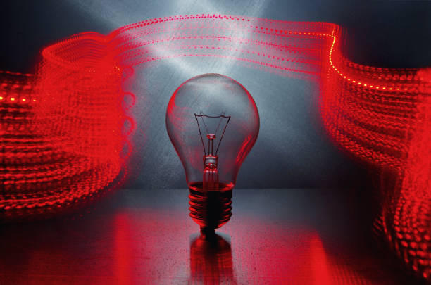 istock Light bulb and abstract background. Power and energy concept. Electricity and light. 1304568051