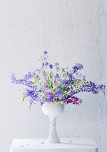 istock summer bouquet in blue and violet colors on white background 1304569216