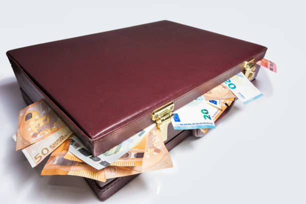 istock Closed 24 hour briefcase with euro banknotes coming out 1304570706