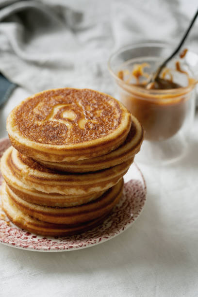 istock Classic American breakfast pancakes with various toppings 1304570975