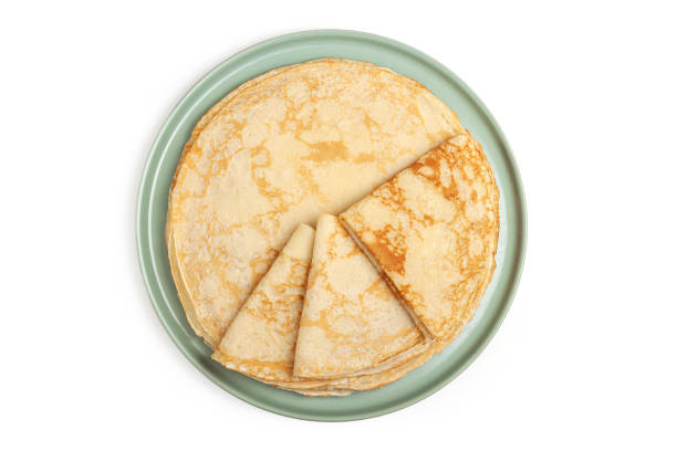 istock Pancake on the green plate on white background 1304571193