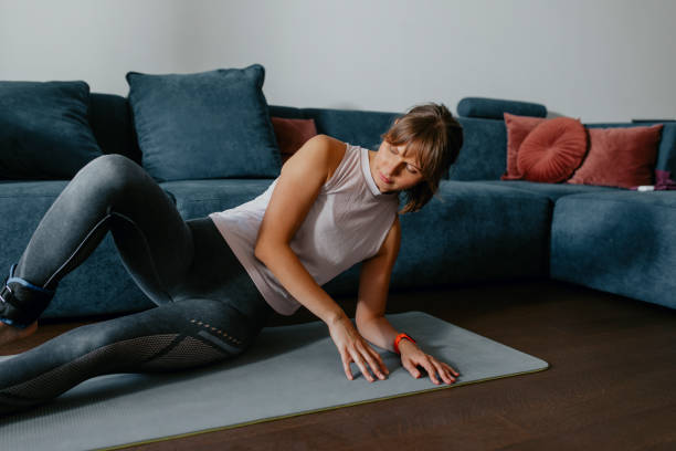 istock Healthy Lifestyle: a Beautiful Woman Doing Relaxing Yoga Exercise at Home 1304575124