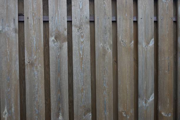 istock brown gray wooden background from old  boards 1304578296