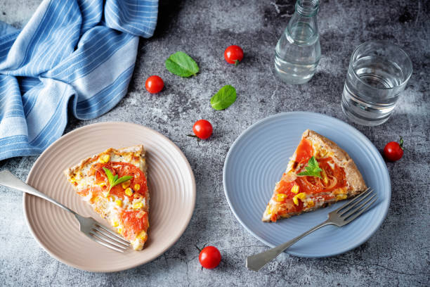 istock Onion tomato cream cheese whole grain galette in a plate 1304579842