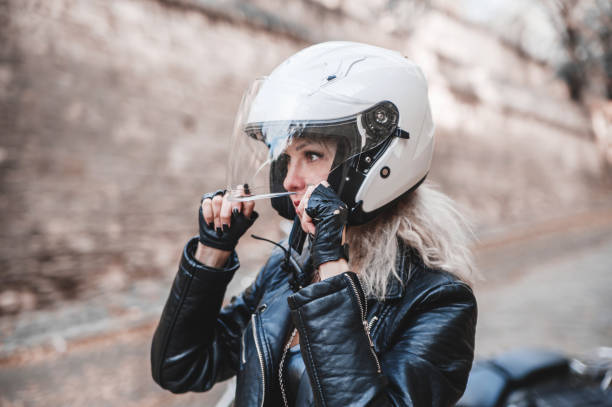 istock Beautiful biker woman outdoor. 1304580130