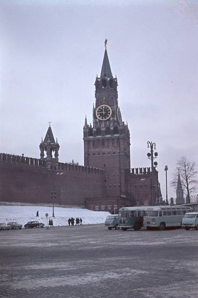 Moscow, Russia (Soviet Union), 1965. The famous Spasskaya Tower with its large clock on the Kremlin wall in Moscow.
