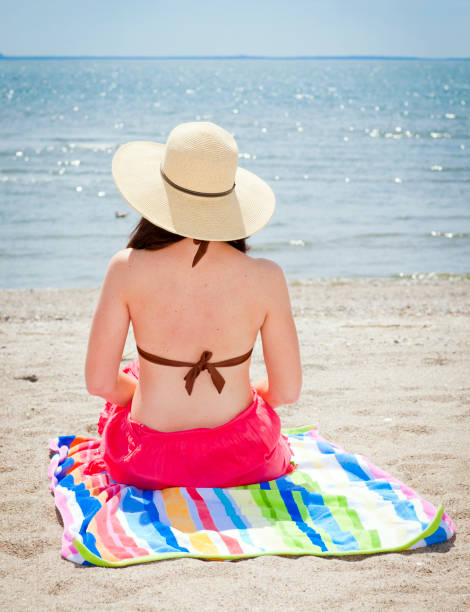 istock Woman at beach 1304581478