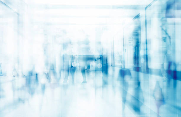Abstract blurred interior of corridor clinic background in blue color , blurry image