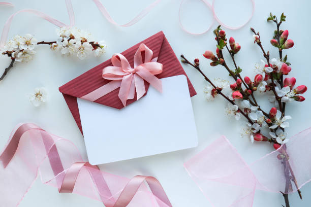 istock spring flowers. flowering branches on a white background 1304583344