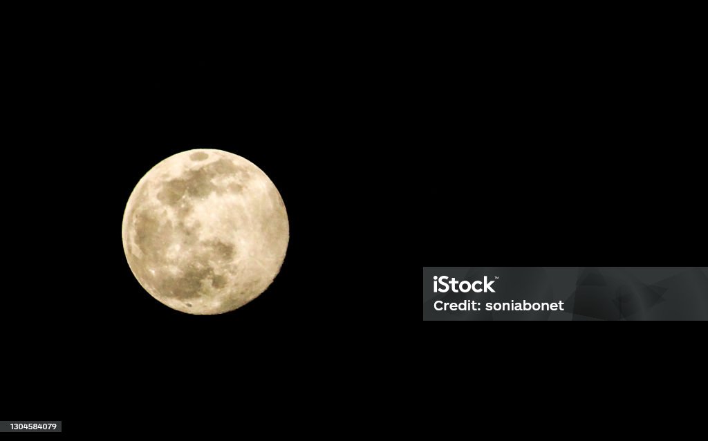 Beautiful Full moon in southern Spain Full moon in southern Spain in summer Moon Stock Photo