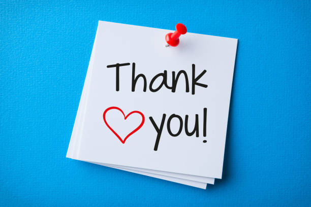 istock White Sticky Note With Thank You And Red Push Pin On Blue Background 1304590946