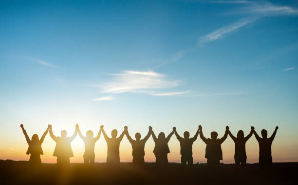 istock Silhouette of group business team. Teamwork concept. 1304591993