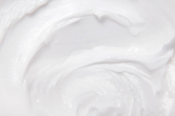 istock White texture of cream background 1304593983