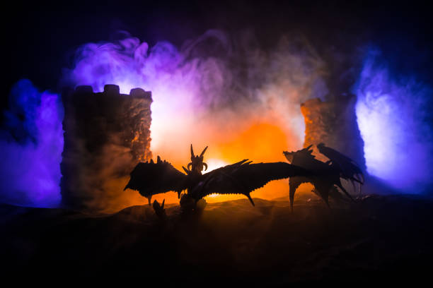 istock Battle between dragon and heroic soldiers. Creative table decoration. Selective focus 1304594161