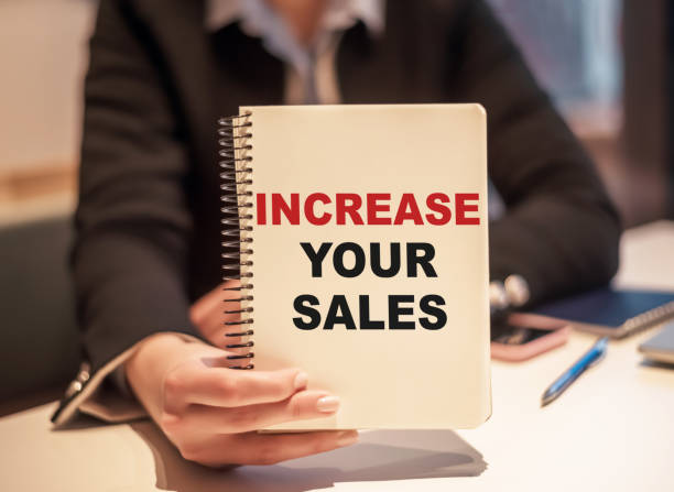 istock Increase your sales - text on notepad. Business concept 1304595539