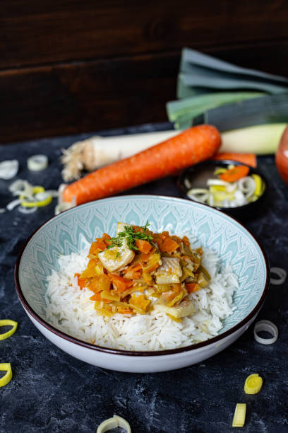 istock Fish curry with rice upright photo 1304596424