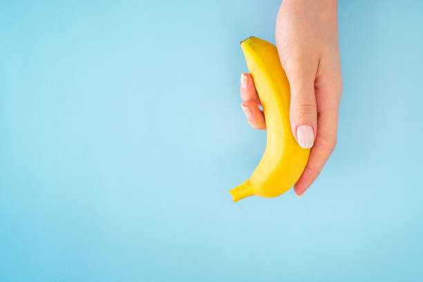 istock Yellow bananas on the blue background 1304597317