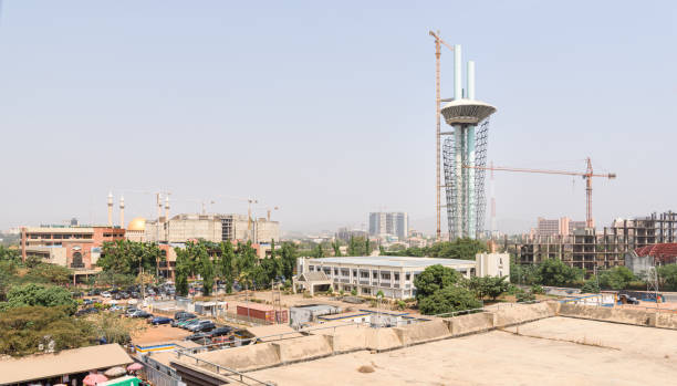 Millenium Tower in Abuja, Nigeria, West Africa Abuja, Nigeria - 27 Jan 2021: The Millenium Tower and Cultural Centre is the tallest architecture project in Abuja, Nigeria, West Africa. Its three pillars support an observation deck with panoramic views above the capital city and a restaurant. abuja stock pictures, royalty-free photos & images